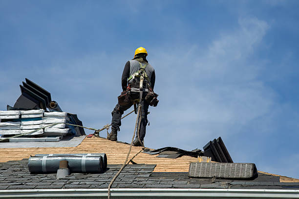 Professional Gutter Installation technician working in Denton, NE